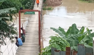 Intensitas Hujan Tinggi,Sungai Way Sekampung Meluap