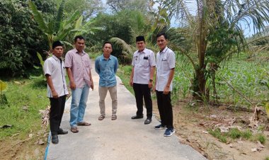 Peratin pekon Pekonmon arwansyah,spd, giat bekerja membuat pisik rabat beton yang berkualitas patut di contoh