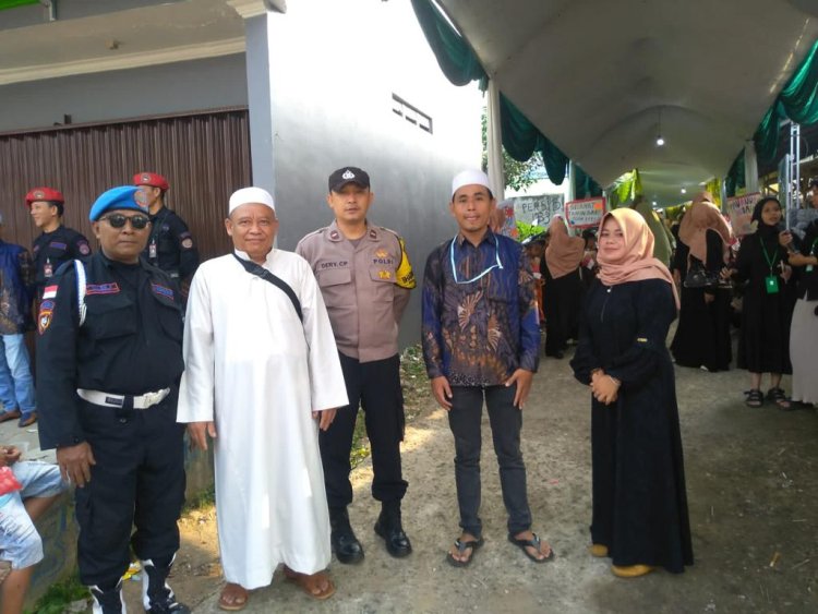 Bhabinkamtibmas Dan Bhabinsa Lakukan Pengamanan Serta Monitoring Giat Dongdang Dalam Rangka Memperingati Tahun Baru Islam 10 Muharam 1445 H