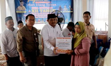 HUT Desa Muntialo, Bupati Serahkan Bantuan Pada Warga Korban Banjir