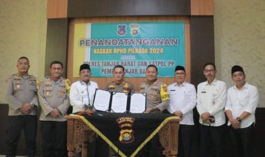 Bupati Saksikan Penandatanganan  NPHD Antara Polres dan Sat Pol-PP Tanjabbar