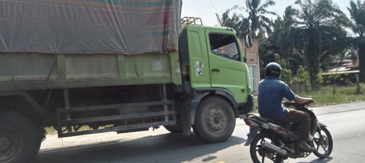 Beranikah Pemda Jambi dan Polda Jambi Menindak Angkutan Batubara yang Eksis di jalan Lintas Timur Tanjab Barat 