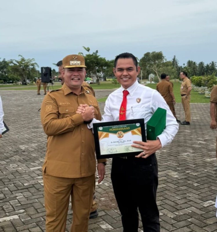 Kasat Reskrim Polres Aceh Utara Dr. Boestani, SH, MH, MSM Dapat Penghargaan dari Bupati 