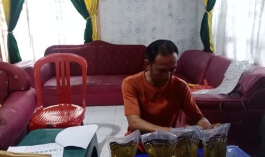 Pemkam Gunung Sangkaran Menyalurkan Bantuan pangan,Beras dan Minyak Goreng