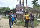 Pasang Banner Himbauan Kamtibmas, Bhabinkamtibmas dan Geuchik Gampong Kapa Ingatkan Warga Utamakan Keselamatan