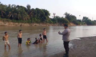 Polsek Negara Batin Imbau Warga Waspada Saat Bermain dan Mandi di Sungai Karta Jaya