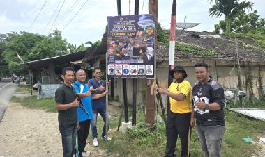 Pasang Banner Himbauan Kamtibmas, Bhabinkamtibmas dan Geuchik Gampong Kapa Ingatkan Warga Utamakan Keselamatan