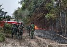 SINERGI  TNI ‑ POLRI DAN WARGA , KEBAKARAN LAHAN PERKEBUNAN DI WAY TUBA BERHASIL DIPADAMKAN